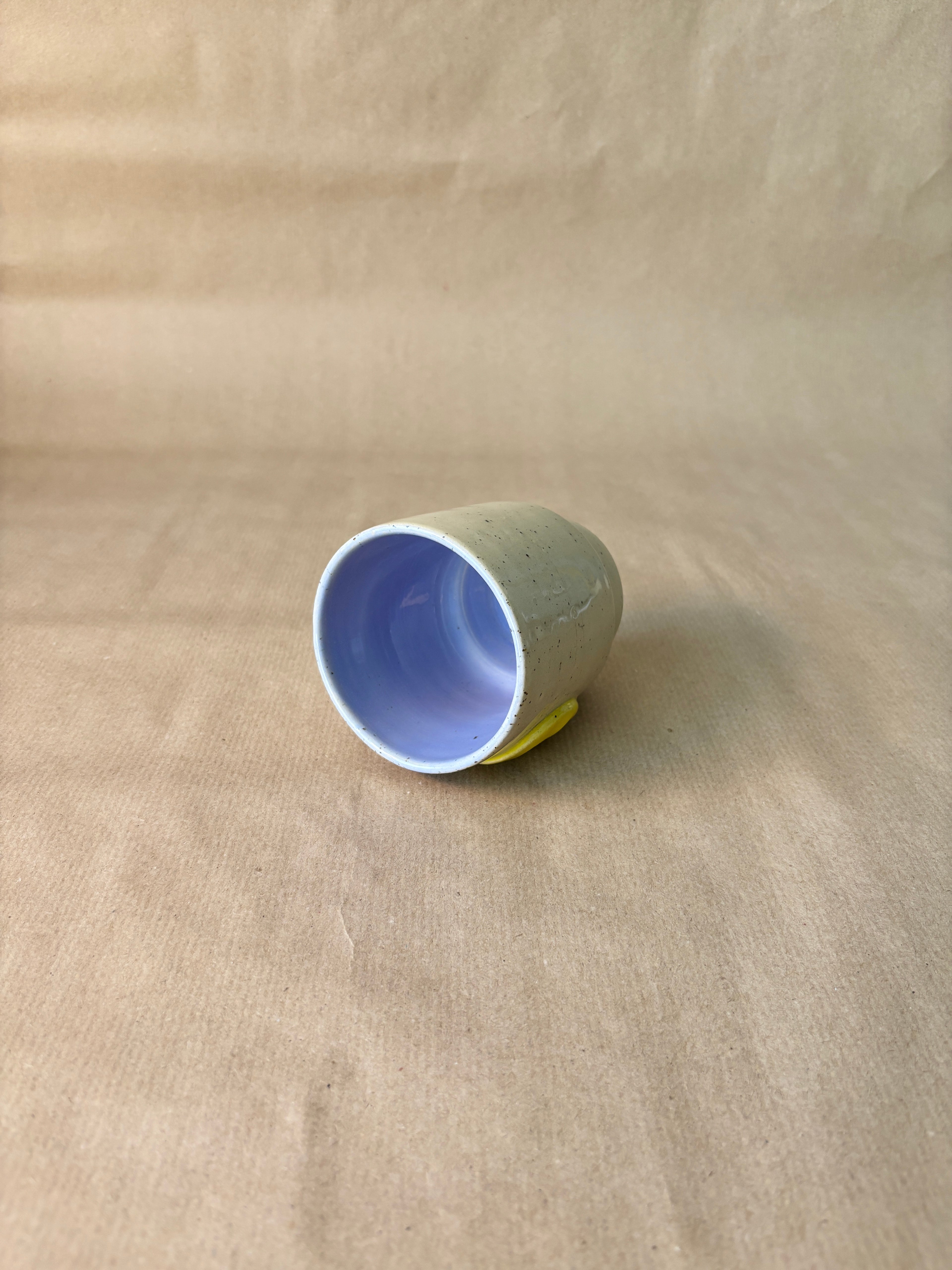 Smiley face stapel cup lila