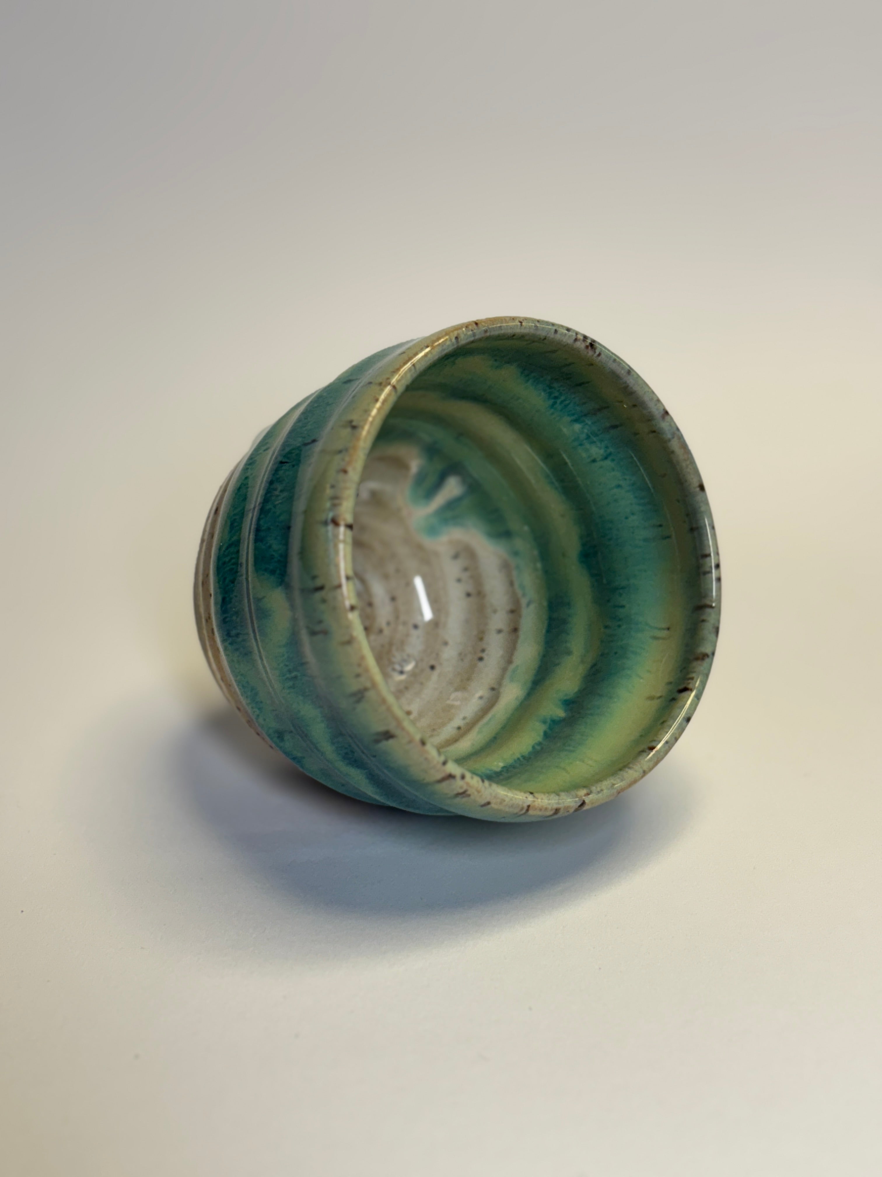 Swirl cup